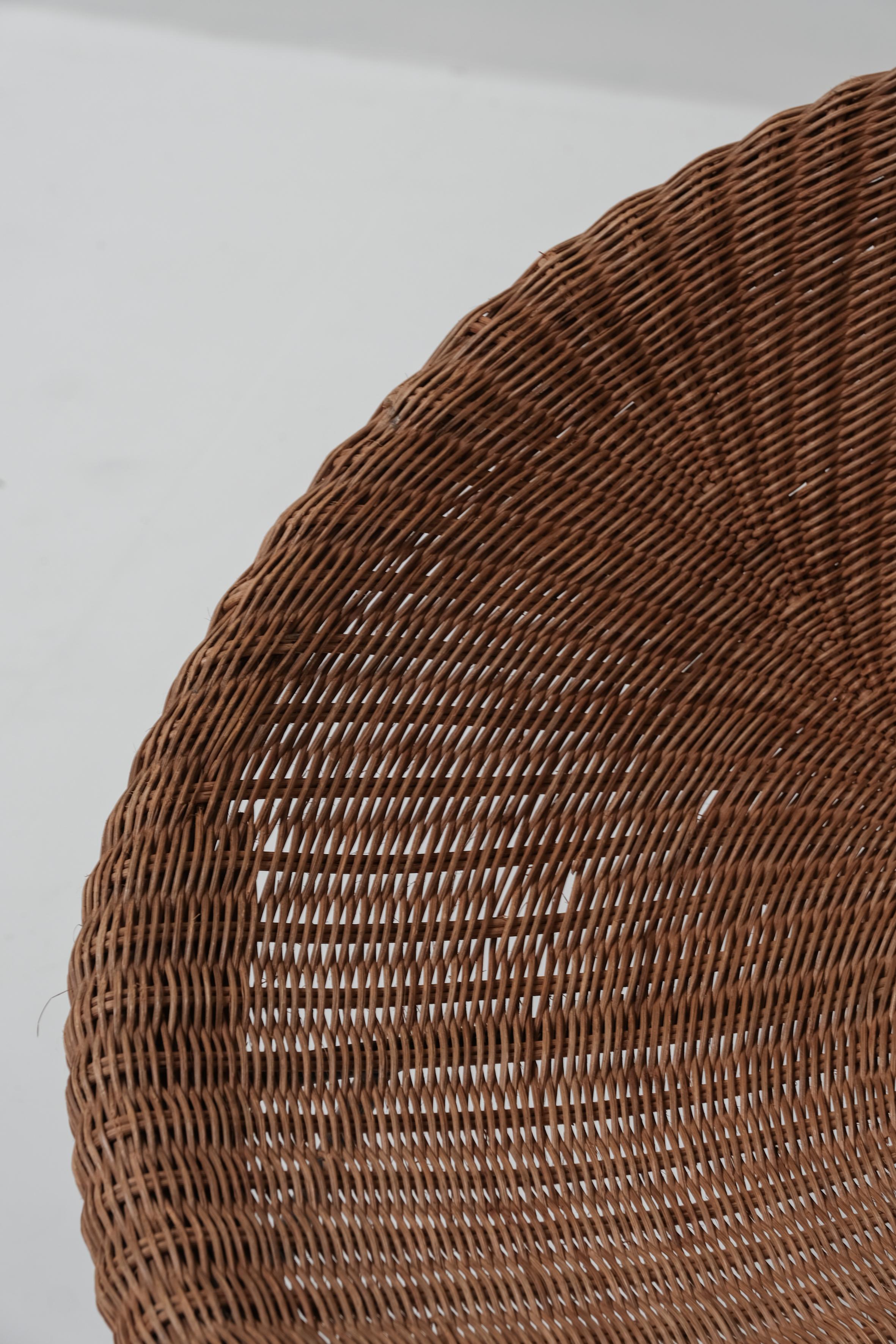 A pair of wicker bucket chairs 1970 8