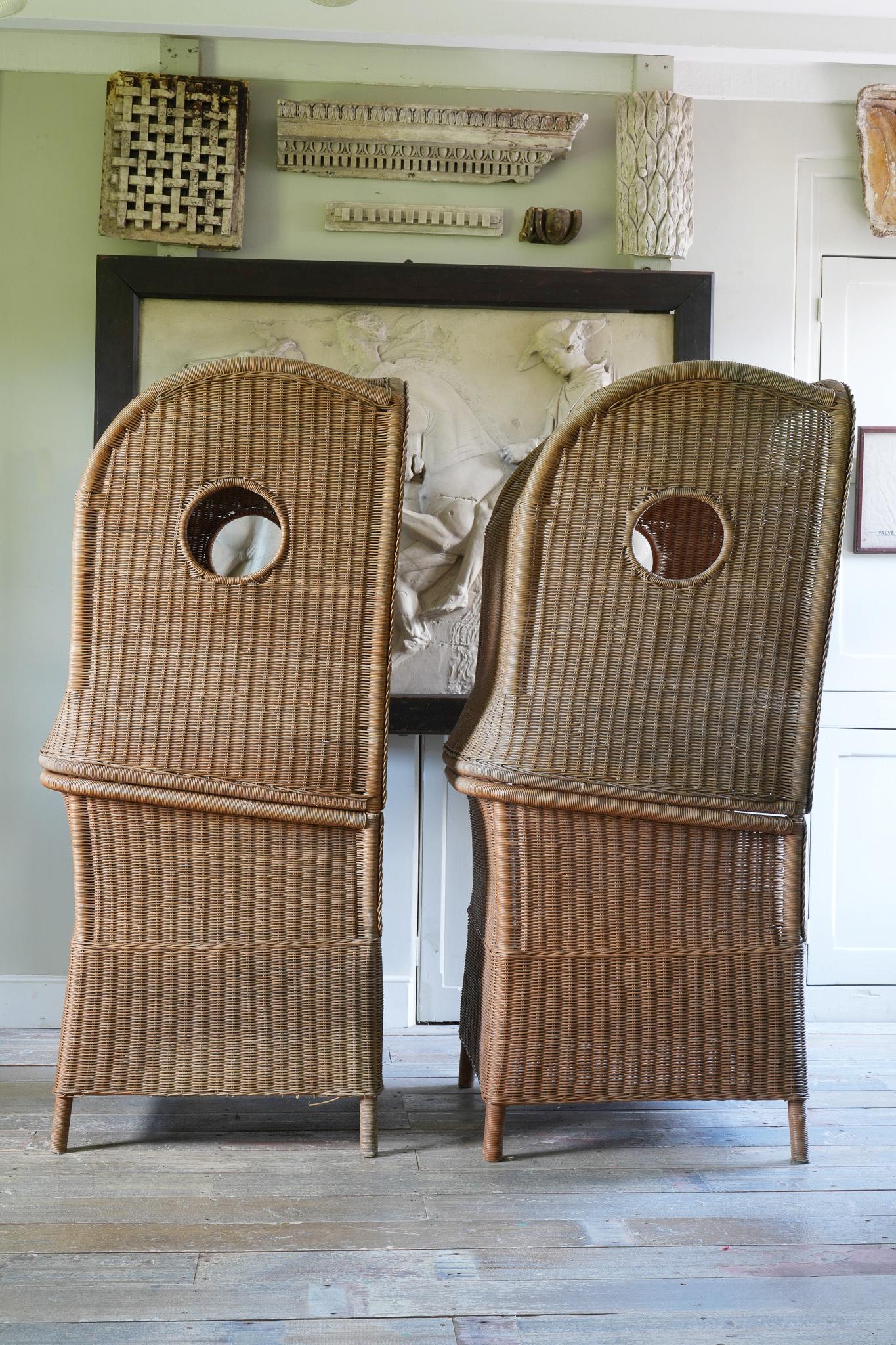 A pair of hooded wicker chairs by De Vries.

Pool side, garden, terrace or hall way.