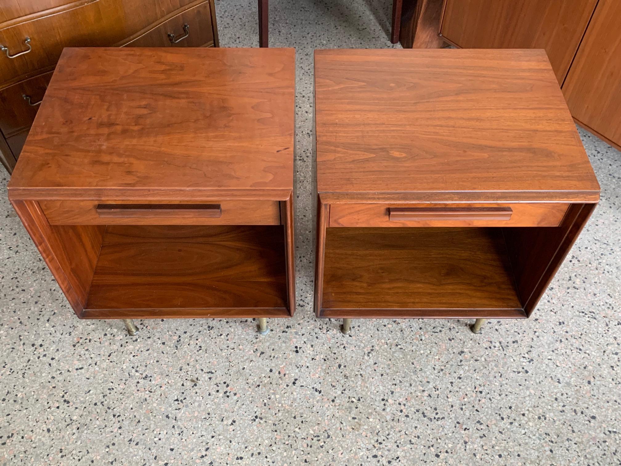 A pair of Classic Widdicomb night stands, brass legs, walnut. Single drawer and open space underneath.