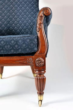 A pair of William IV rosewood library armchairs, circa 1830