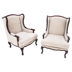A pair of wingback armchairs, Western Europe, early 20th century. After renovati