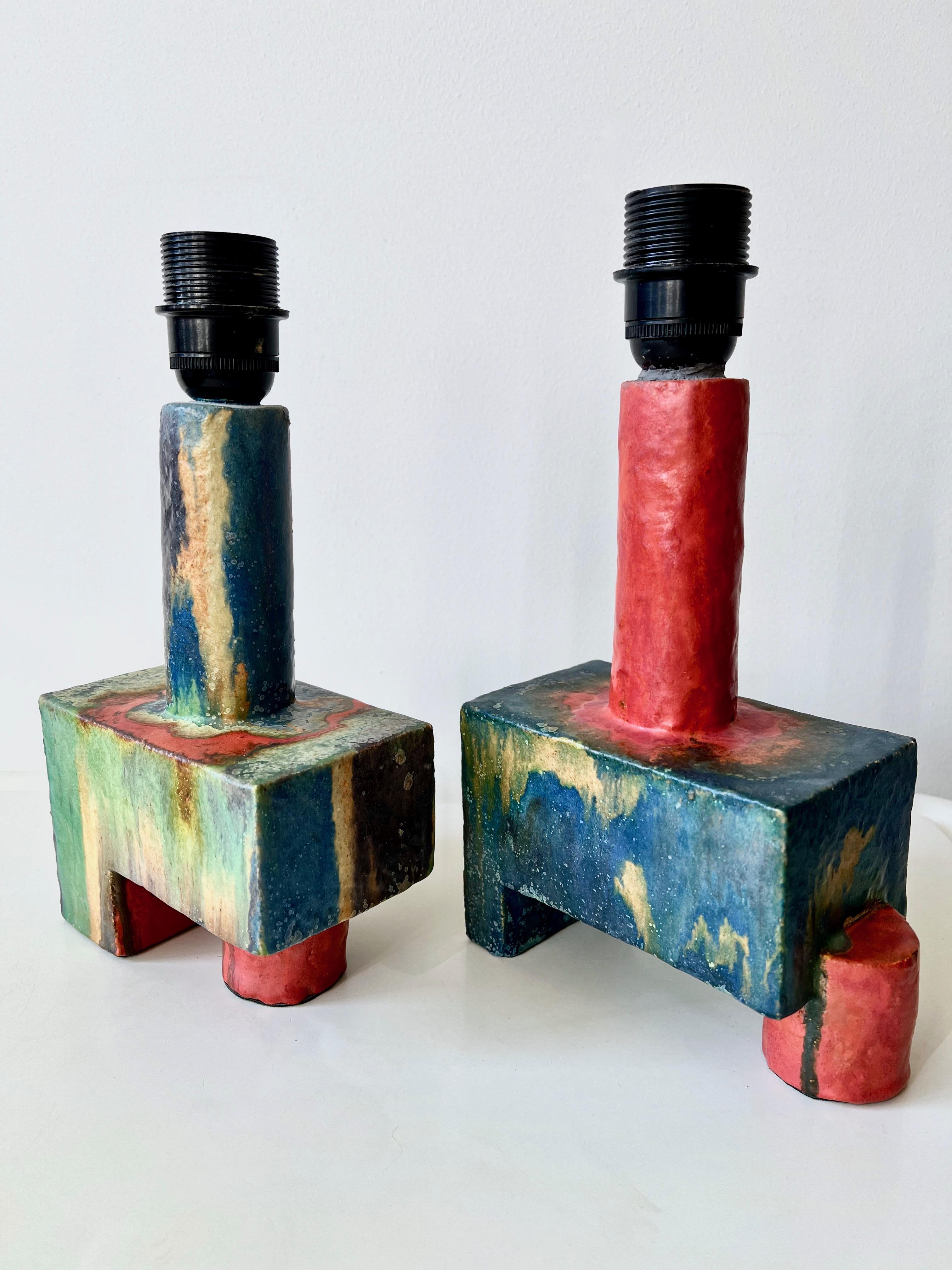 The jewel in the crown. A pair of truly unique ceramic table lamps, signed 'HT'. Clearly one offs made by a gifted artist in the 1950-60's. We don't know where to start praising these lamps: the cubist forms are stunning, the colours and patterns