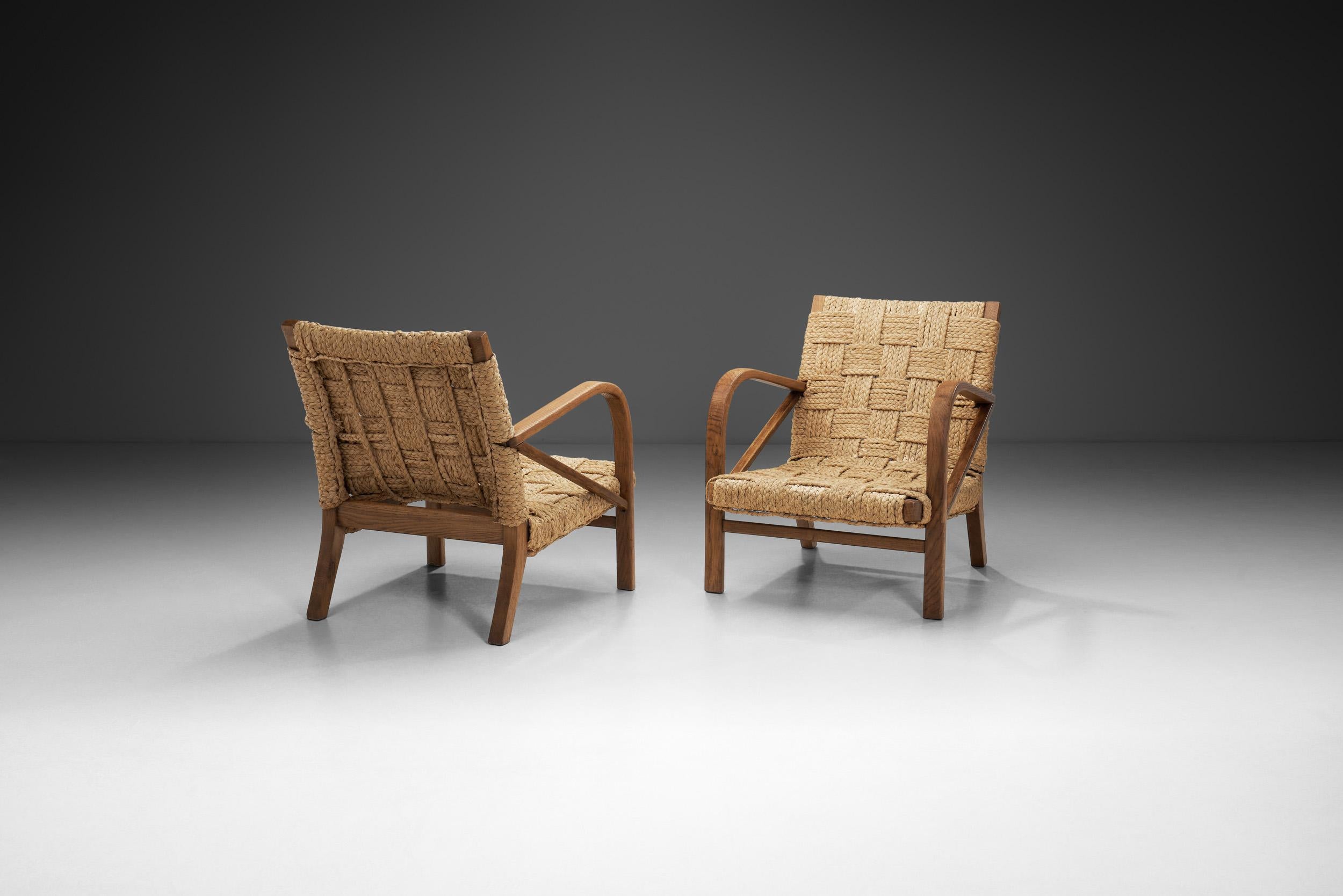 French A Pair of Woven Rope Armchairs by Audoux-Minet, France ca 1950s