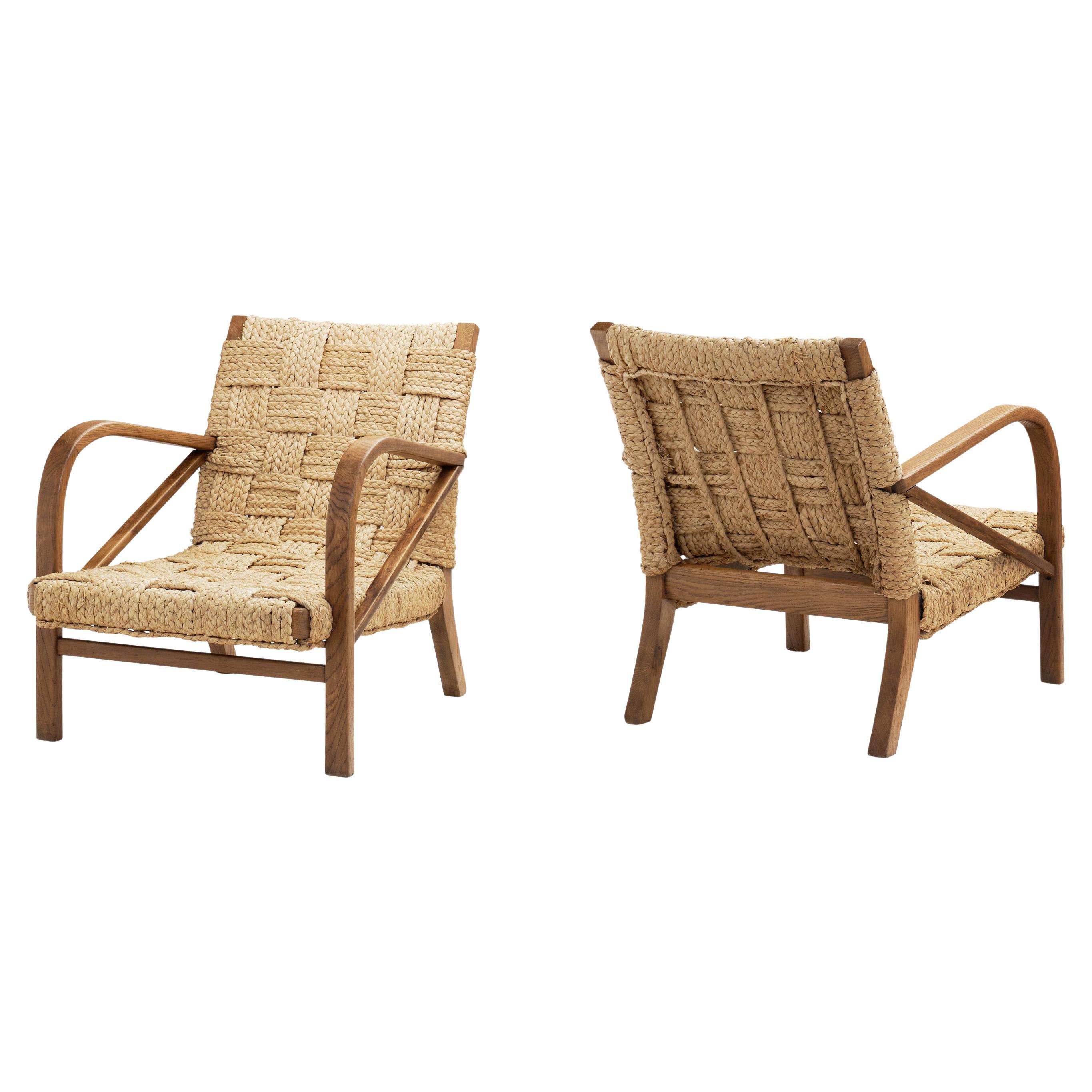 A Pair of Woven Rope Armchairs by Audoux-Minet, France ca 1950s