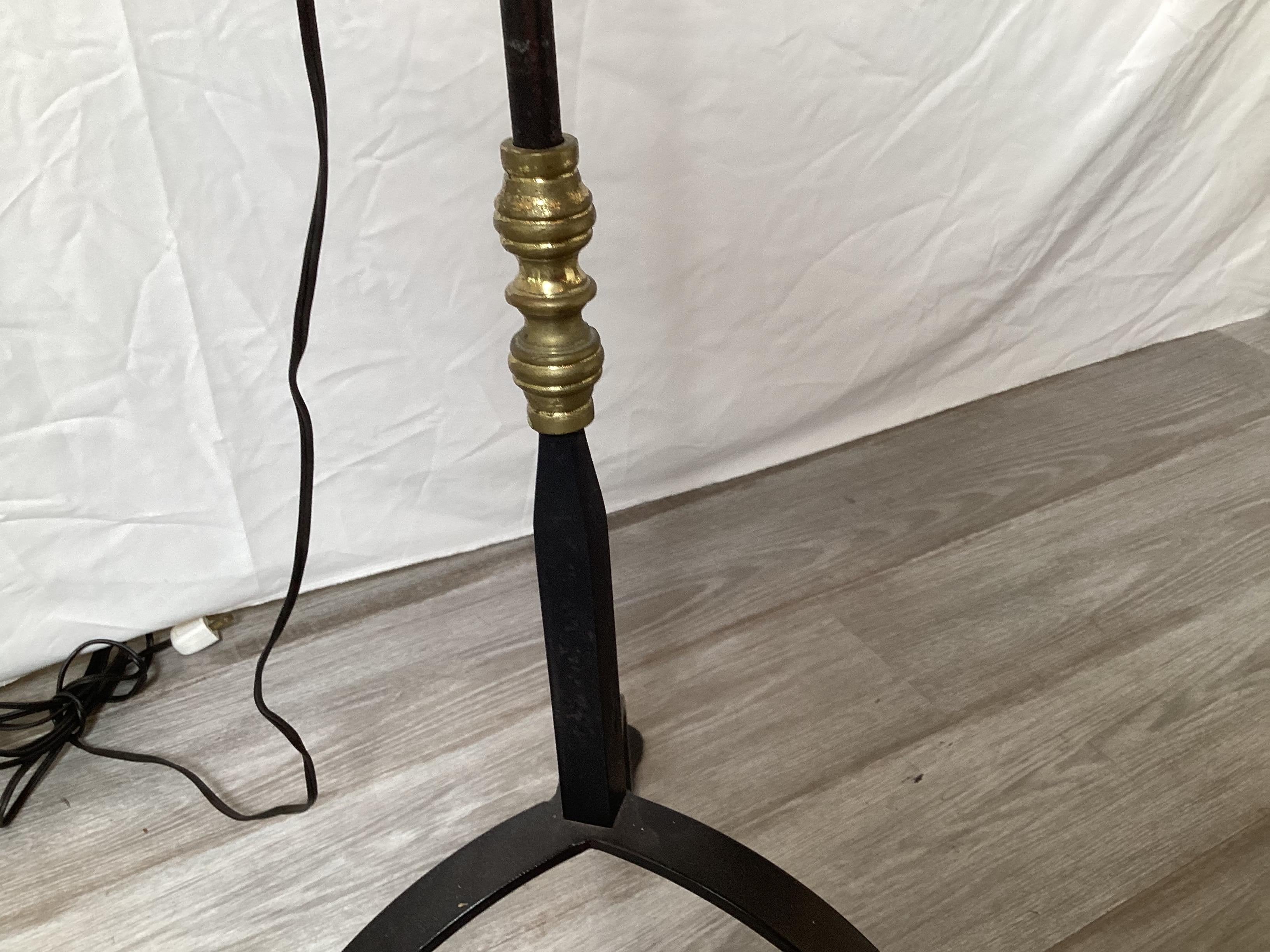 American A Pair of Wroght Iron and Brass Adjustable Floor Lamps For Sale