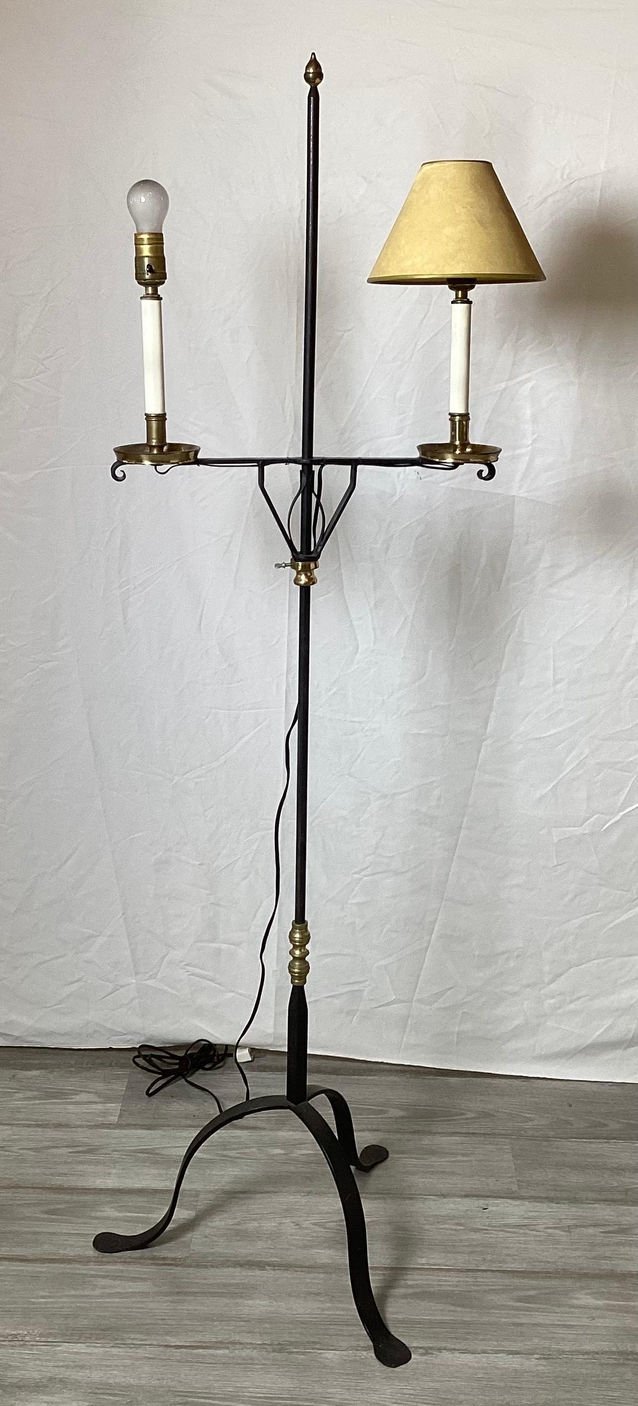 A Pair of Wroght Iron and Brass Adjustable Floor Lamps In Good Condition For Sale In Lambertville, NJ