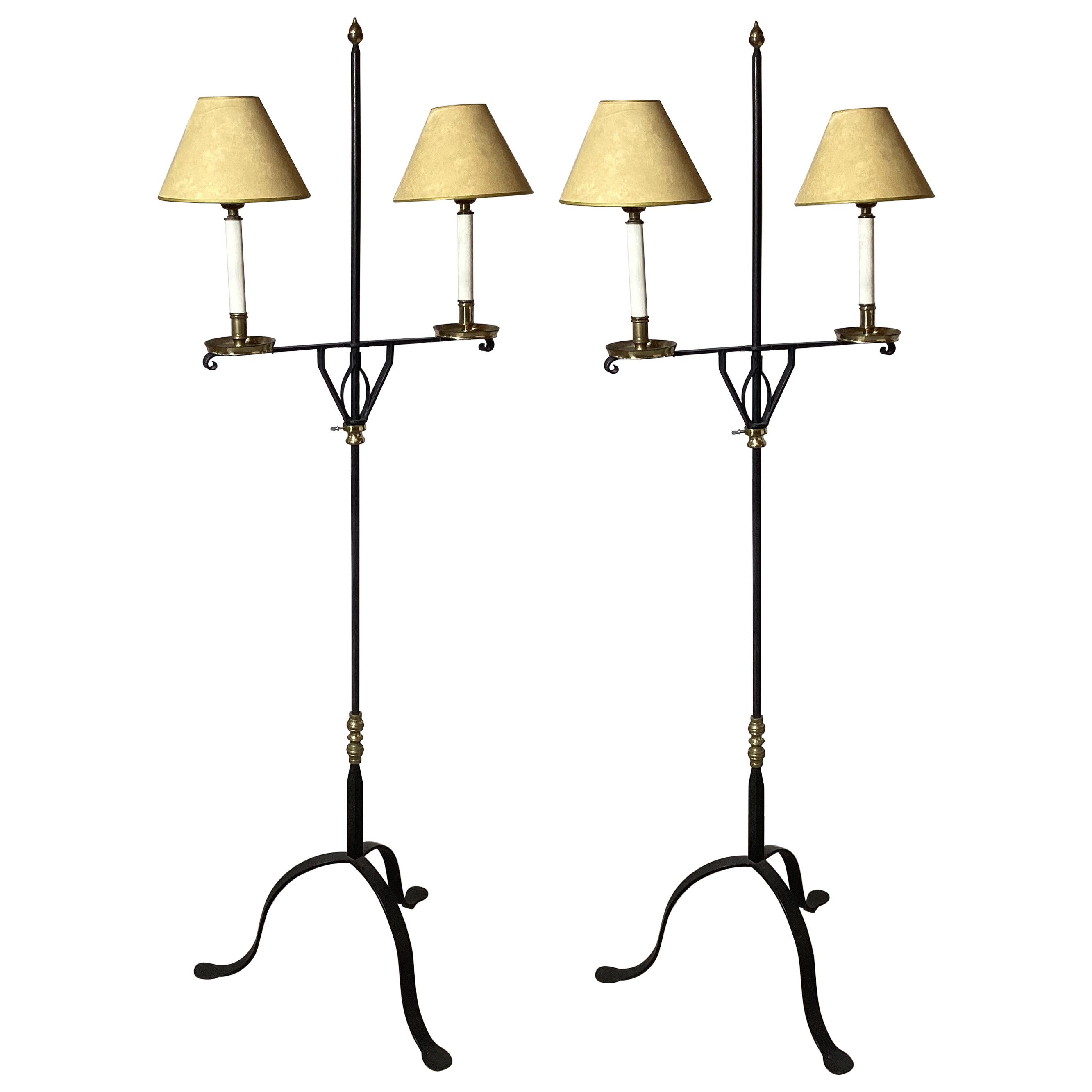 A Pair of Wroght Iron and Brass Adjustable Floor Lamps For Sale