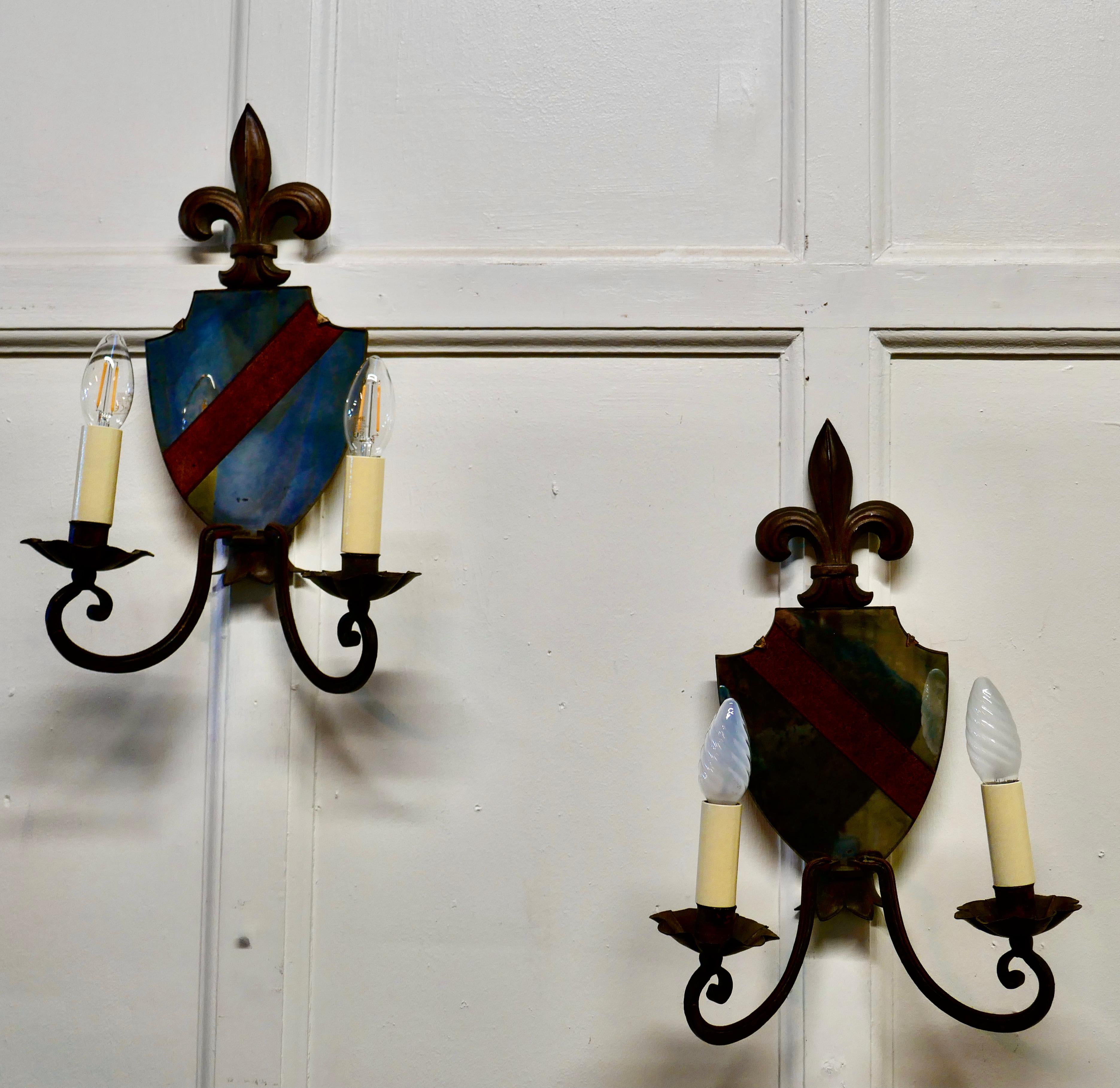 Arts and Crafts Pair of Wrought Iron Heraldic Shield Shaped Girandole Wall Mirrors
