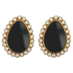 A Pair of Yellow Gold, Black Onyx and Diamond Earrings