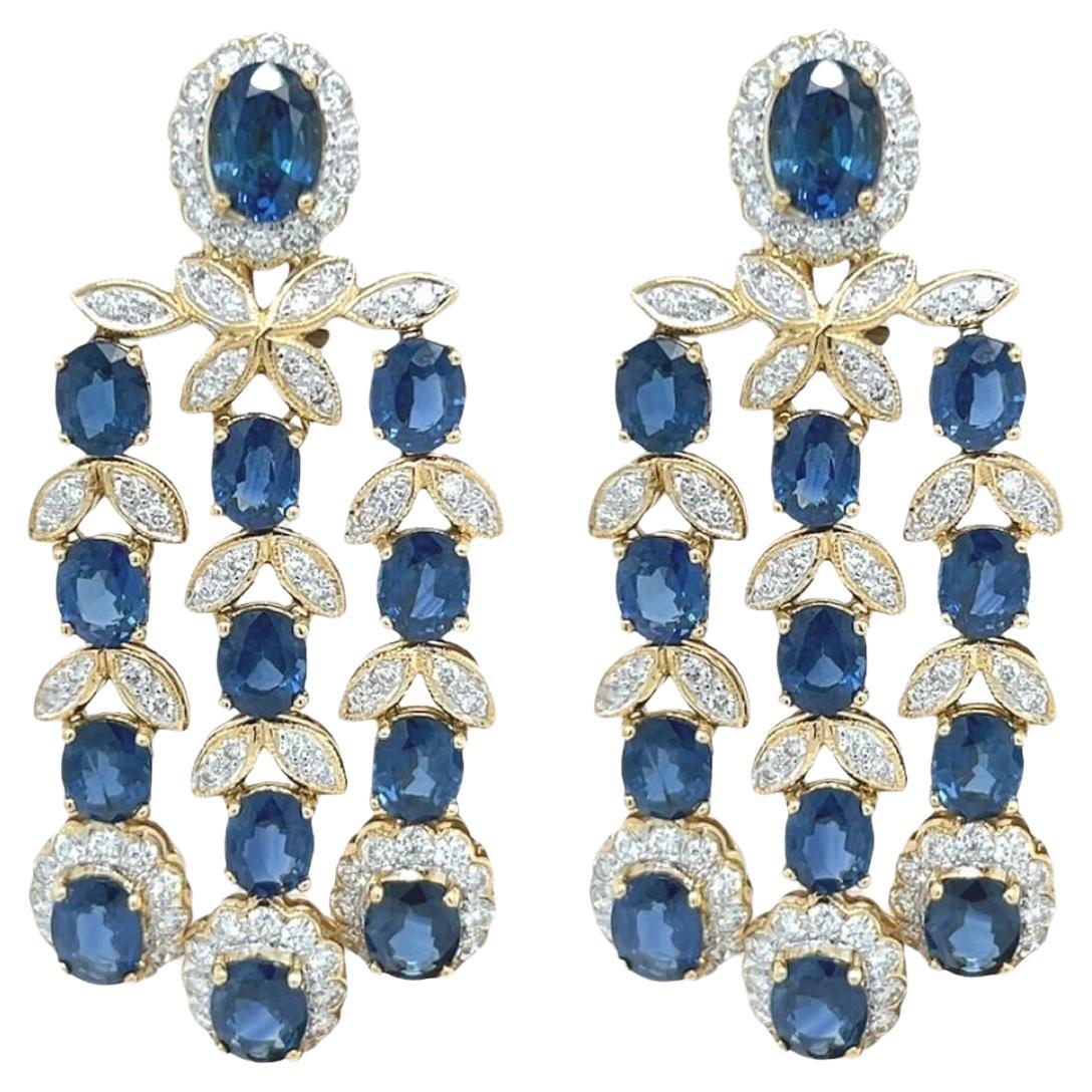 A Pair of Yellow Gold, Sapphire and Diamond Chandelier Earrings For Sale