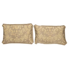 A Pair of Yellow-on-White Gold Fortuny Lumbar Cushions in Carnavalet Pattern