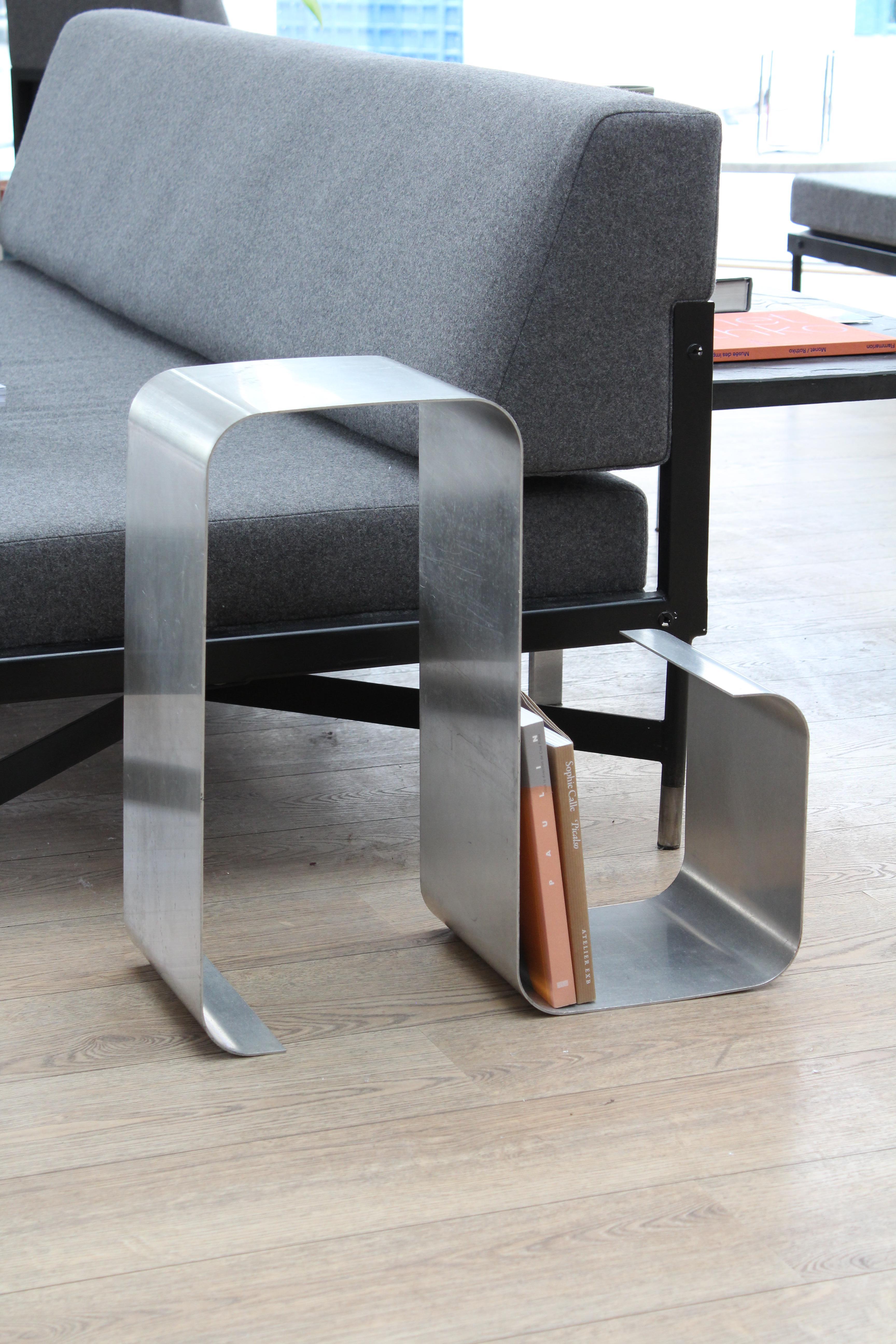 François Monnet was a French designer who made significant contributions to the world of furniture and lighting design in the mid-20th century. The Zig-Zag exemplifies the era's fascination with geometric forms, modern materials, and minimalistic