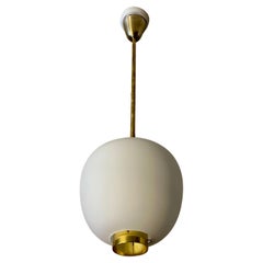 A Pair Paavo Tynell ceiling lamps, manufact Idman.
