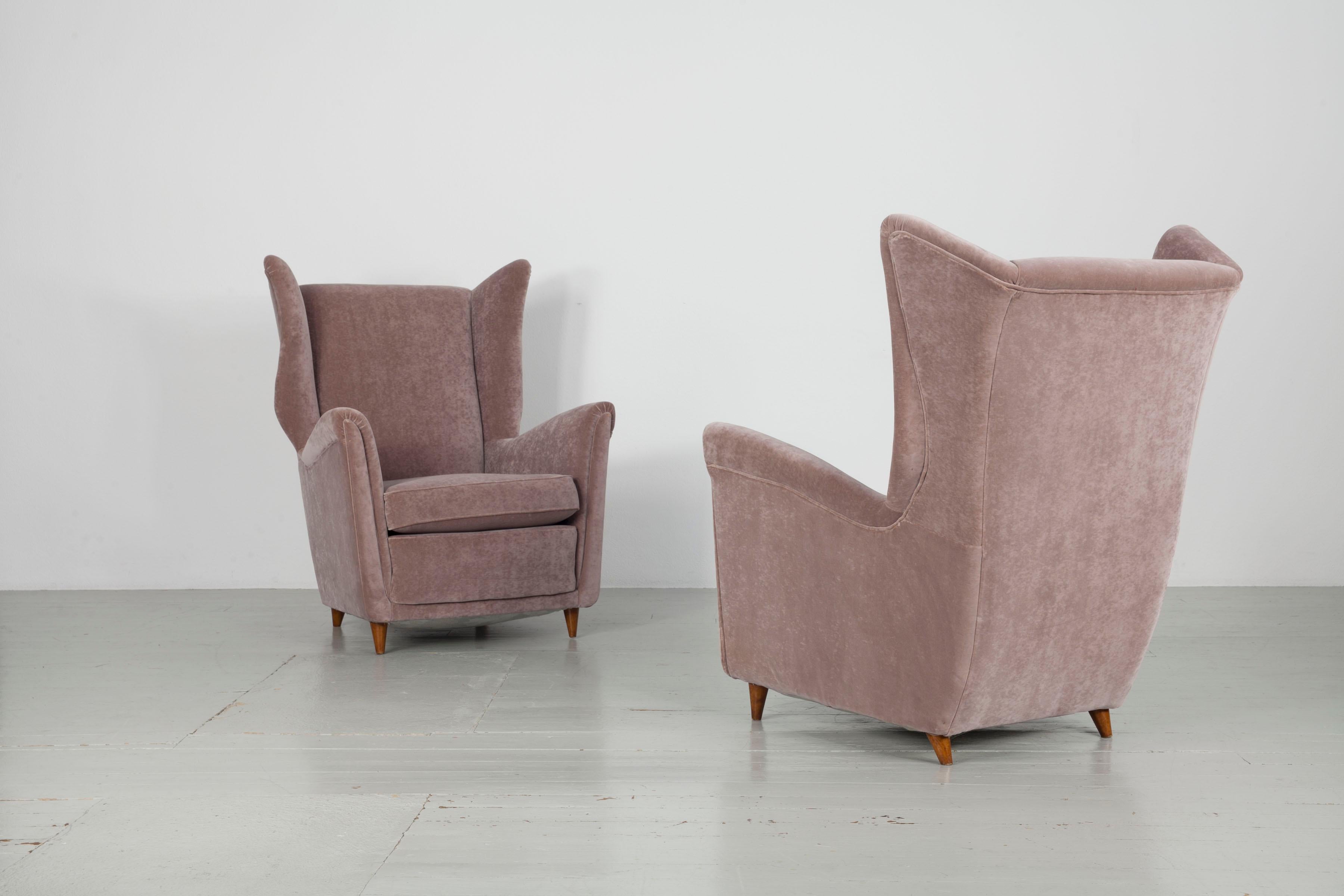 Italian Pair of Melchiorre Bega Wing Chairs from the 1950s For Sale