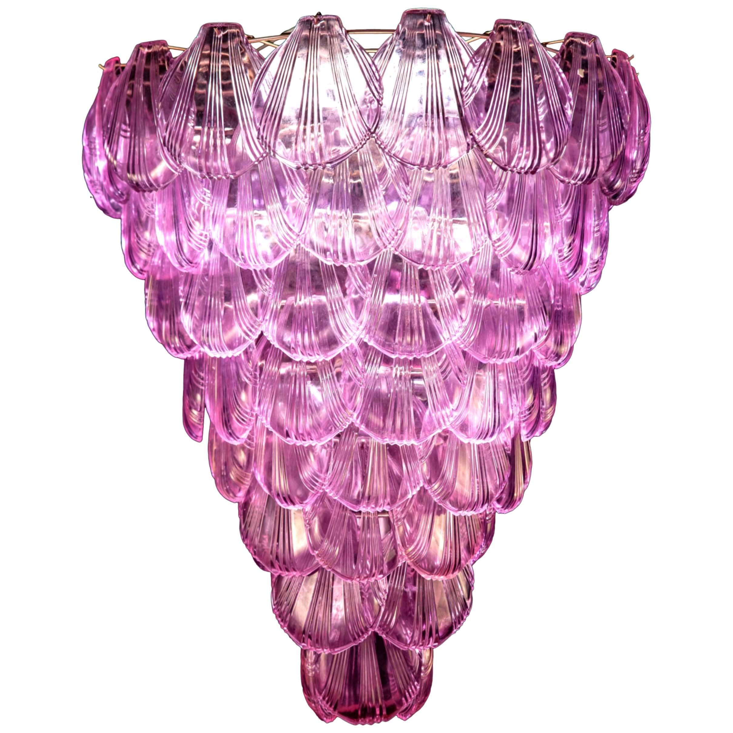 Fabulous eight tier Italian Murano glass chandelier with a cascade of pink shells giving an extraordinary light effect.
Available also a pair.
 