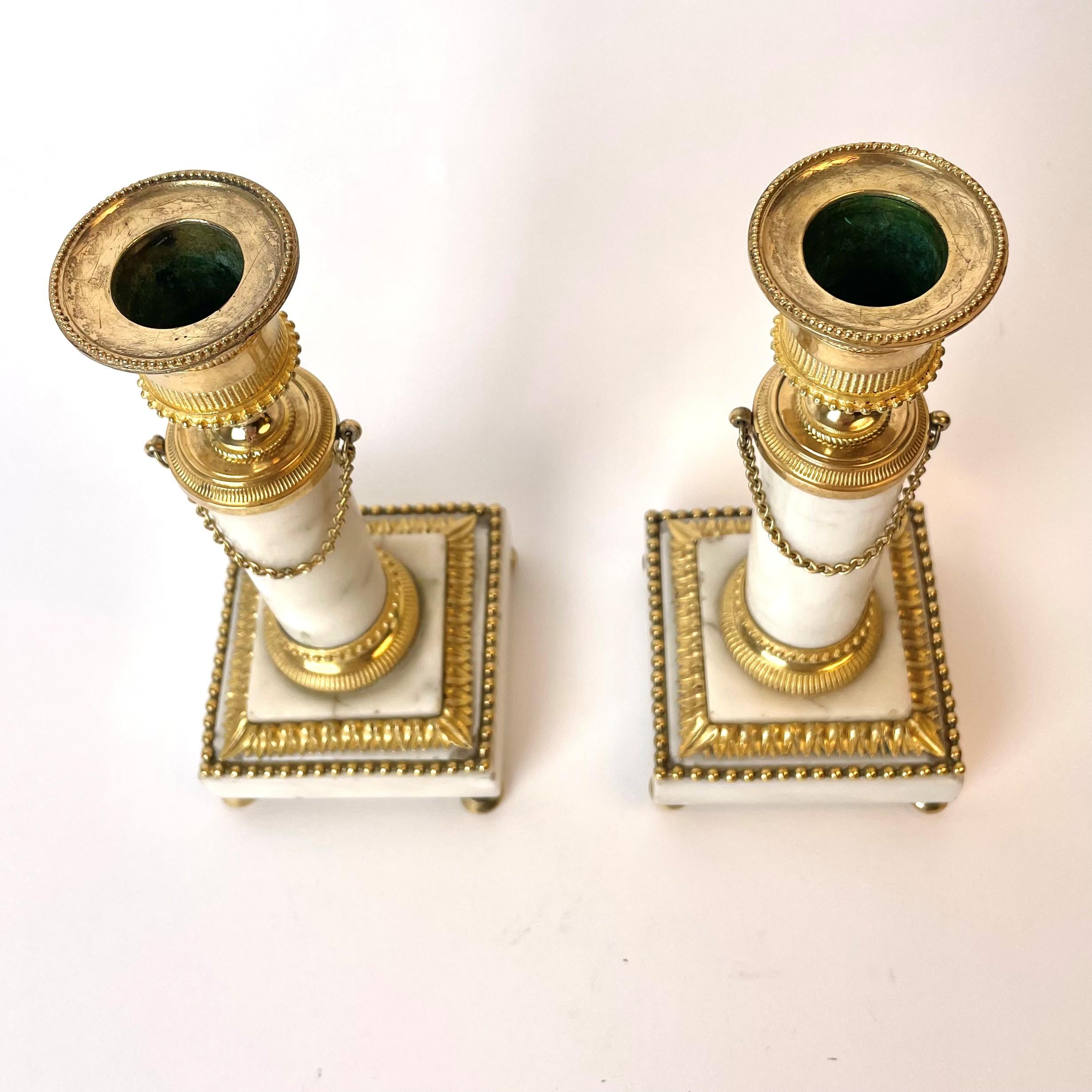 Gold Plate Pair Sophisticated Carrara Marble and Gilt Bronze Candlesticks from the 1780s For Sale