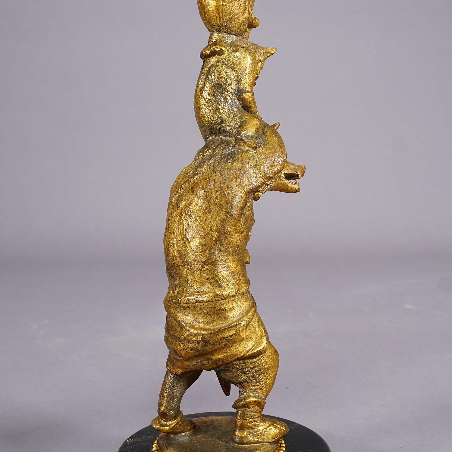 A Pair Victorian Casted and Gilded Iron Candle Stick with Bears For Sale 6