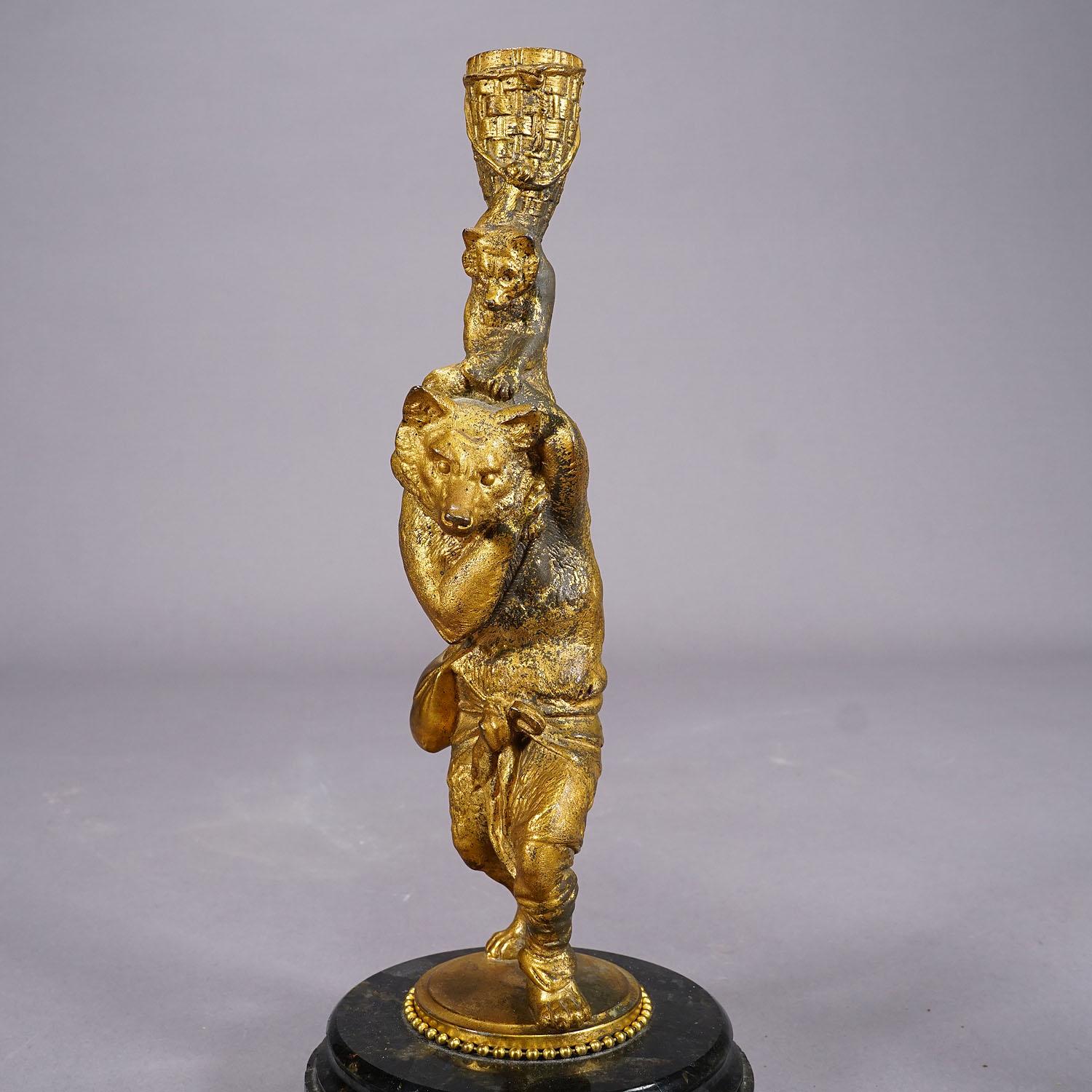 A Pair Victorian Casted and Gilded Iron Candle Stick with Bears In Good Condition For Sale In Berghuelen, DE
