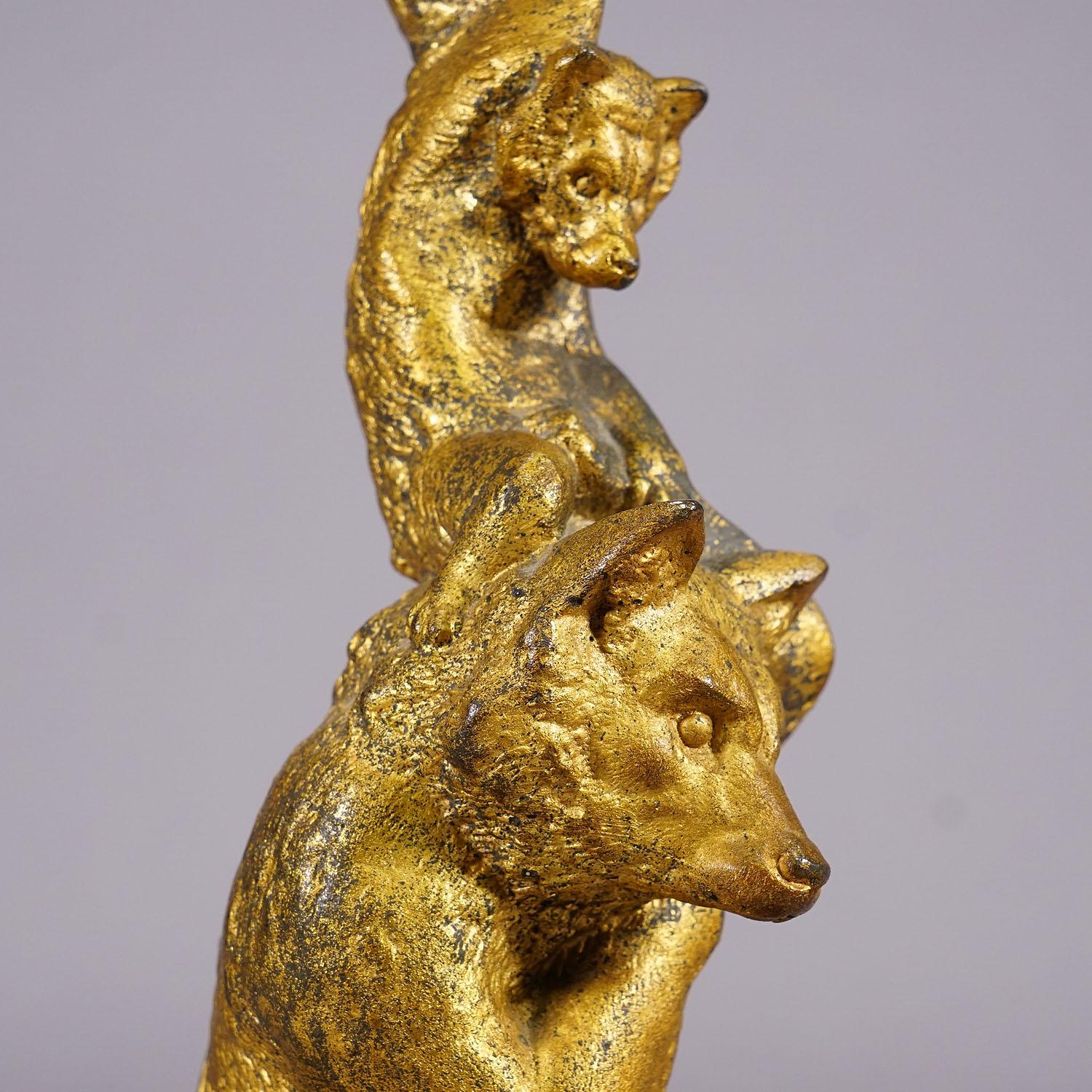 A Pair Victorian Casted and Gilded Iron Candle Stick with Bears For Sale 1
