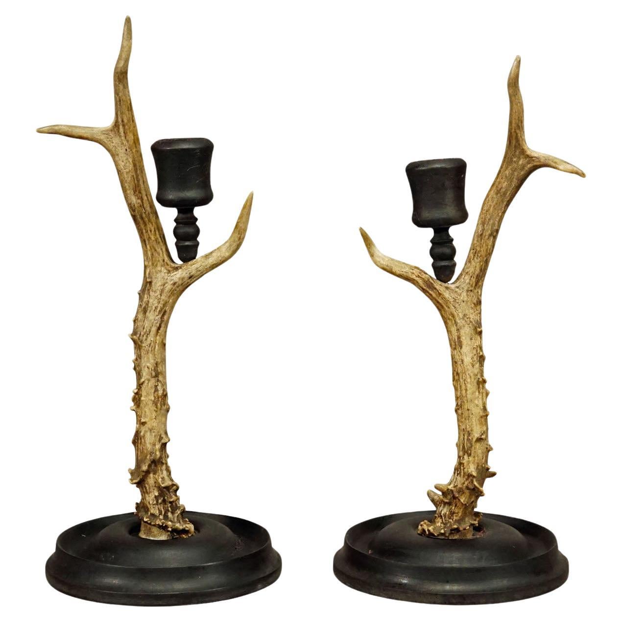 A Pair Vintage Black Forest Candle Holders with Wooden Base and Spout For Sale