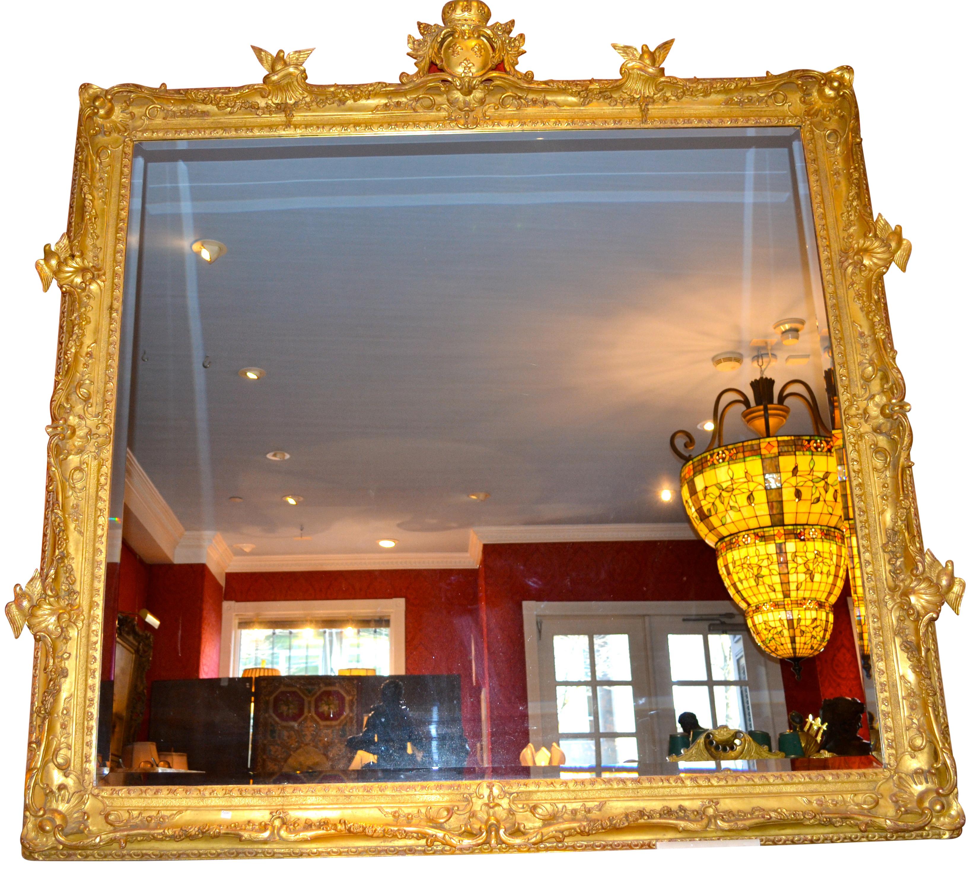 Bois doré Miroir palatial en bois doré sculpté de style Louis XV du 19ème siècle français en vente