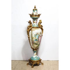 A Palatial French Ormolu-Mounted Sevres Porcelain Hand-Painted Vase and Cover