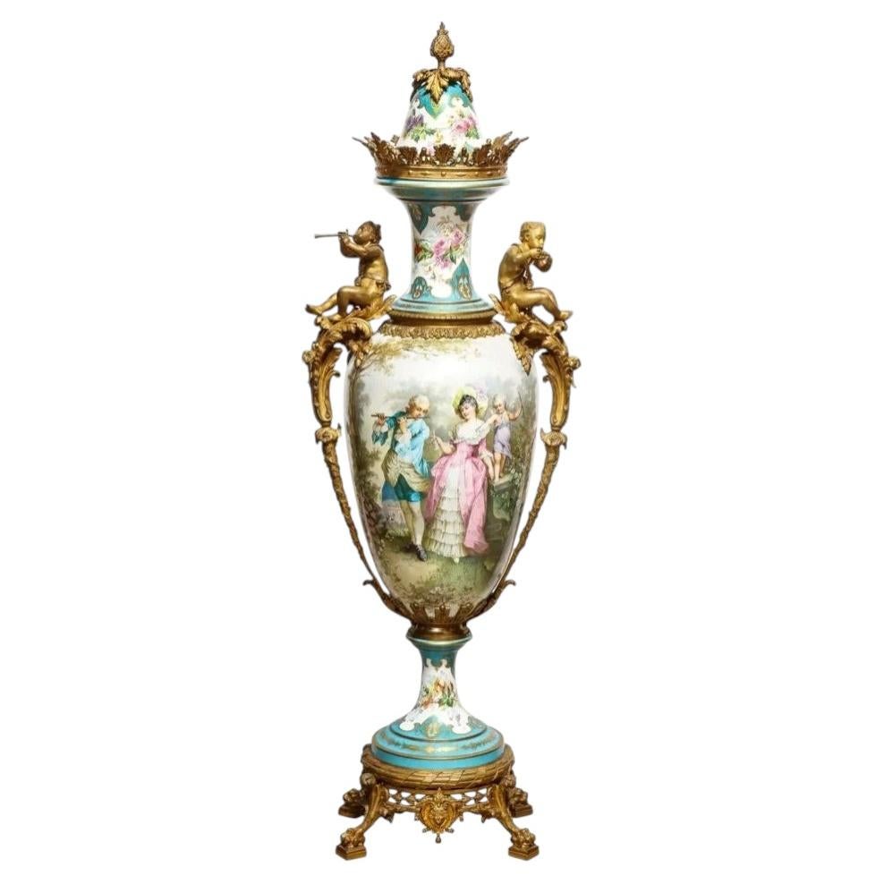 A Palatial French Ormolu-Mounted Sevres Porcelain Hand-Painted Vase and Cover For Sale