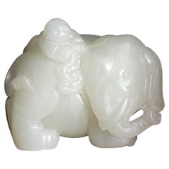 A Pale Celadon Hetian Jade Carving of an Elephant with Boy