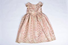 A Pale pink brocaded Moiré silk Crinoline ball gown Circa 1860