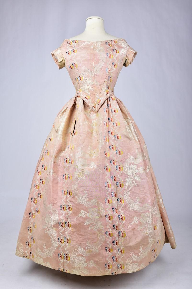 Women's A Pale pink brocaded Moiré silk Crinoline ball gown Circa 1860 For Sale