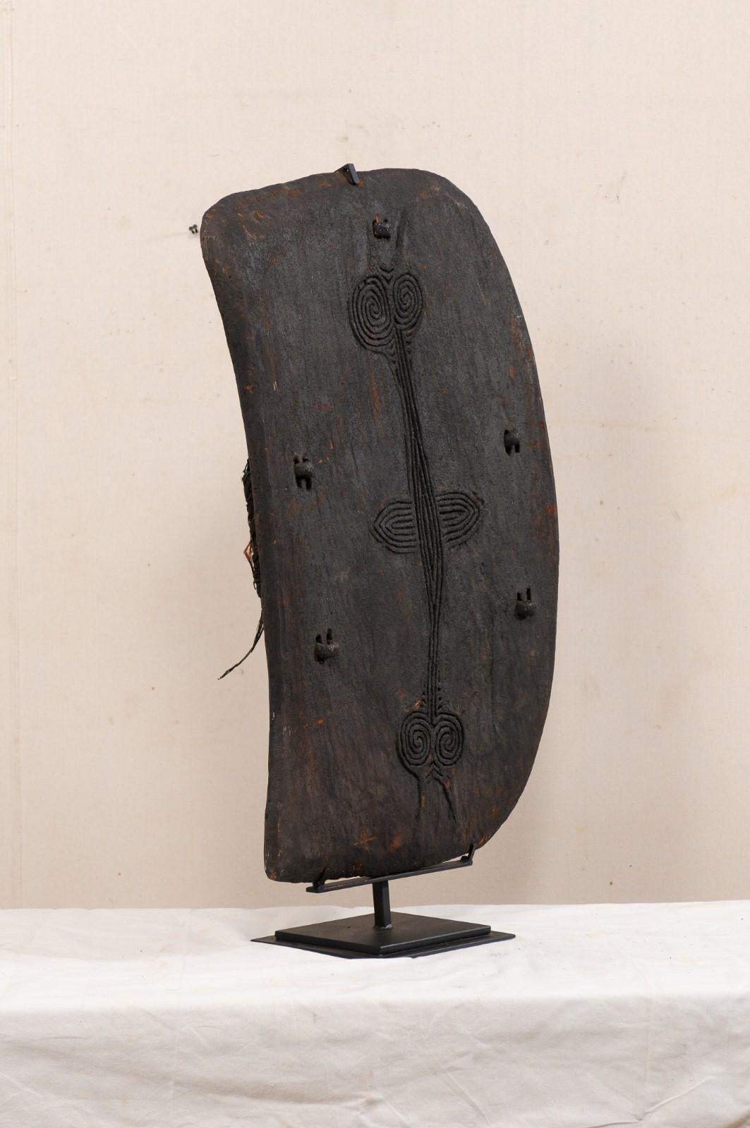 Papua New Guinea Carved-Wood Lumi Shield on Custom Iron Stand For Sale 2