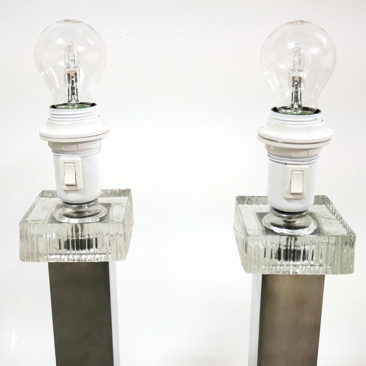 Beautiful Scandinavian table lamps in glass and brushed aluminium.
All electric parts is new.

Height including lamp socket: 47 cm / 18.5 inch.
