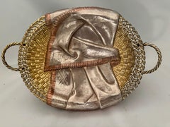 A Parcel-Gilt Silver Trompe L'oeil Bread Basket, Khlebnikov, Moscow, 1882