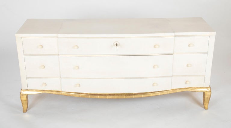 An elegant chest of drawers in parchment, ivory (now replaced with faux ivory) and gold lacquer 1935 Similar model presented at the salon of decorative artists 1935

Examples of this commode can be seen in numerous books on Andre Arbus but not