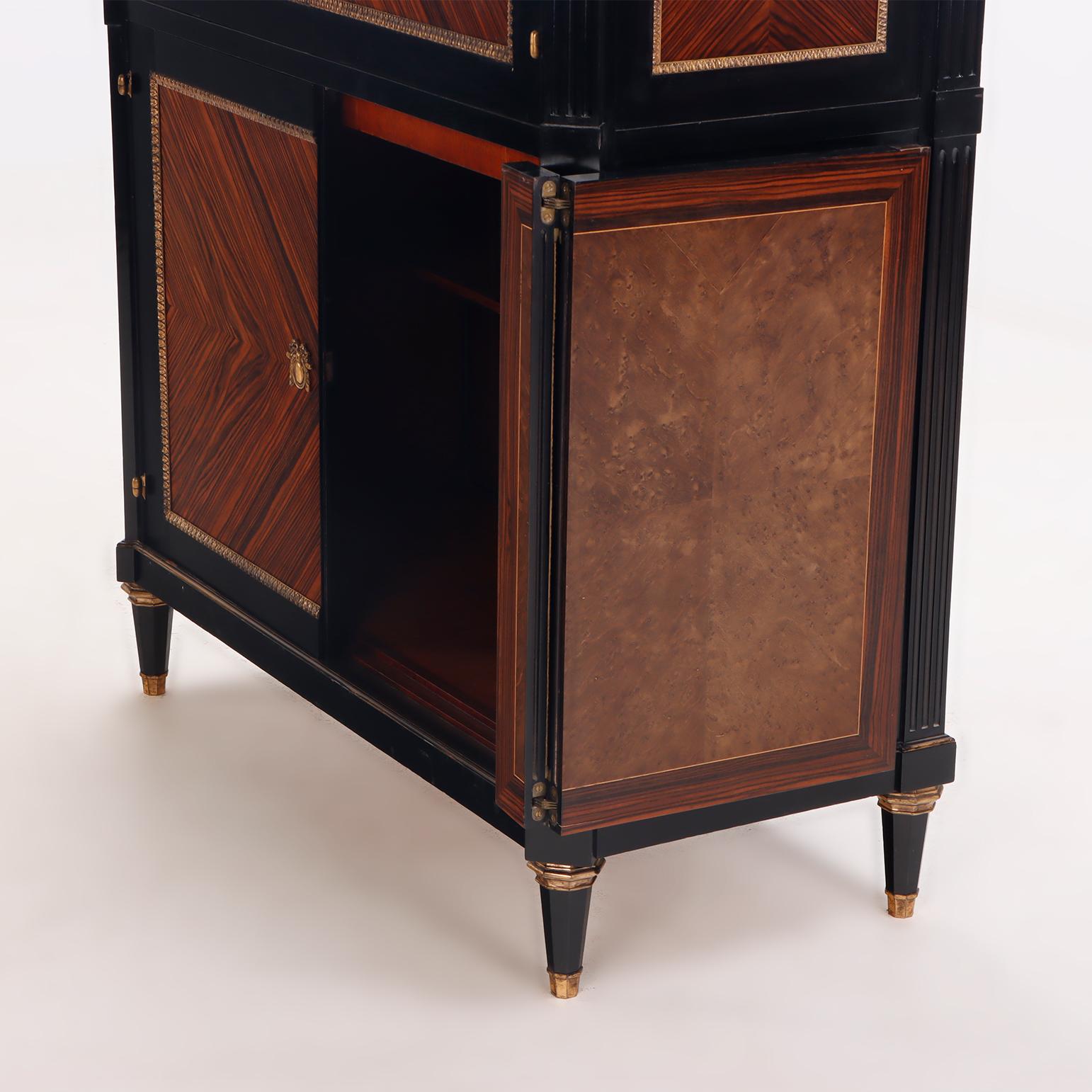 A partial ebonized four door bar cabinet in the manner of Jansen circa 1940. In Good Condition For Sale In Philadelphia, PA