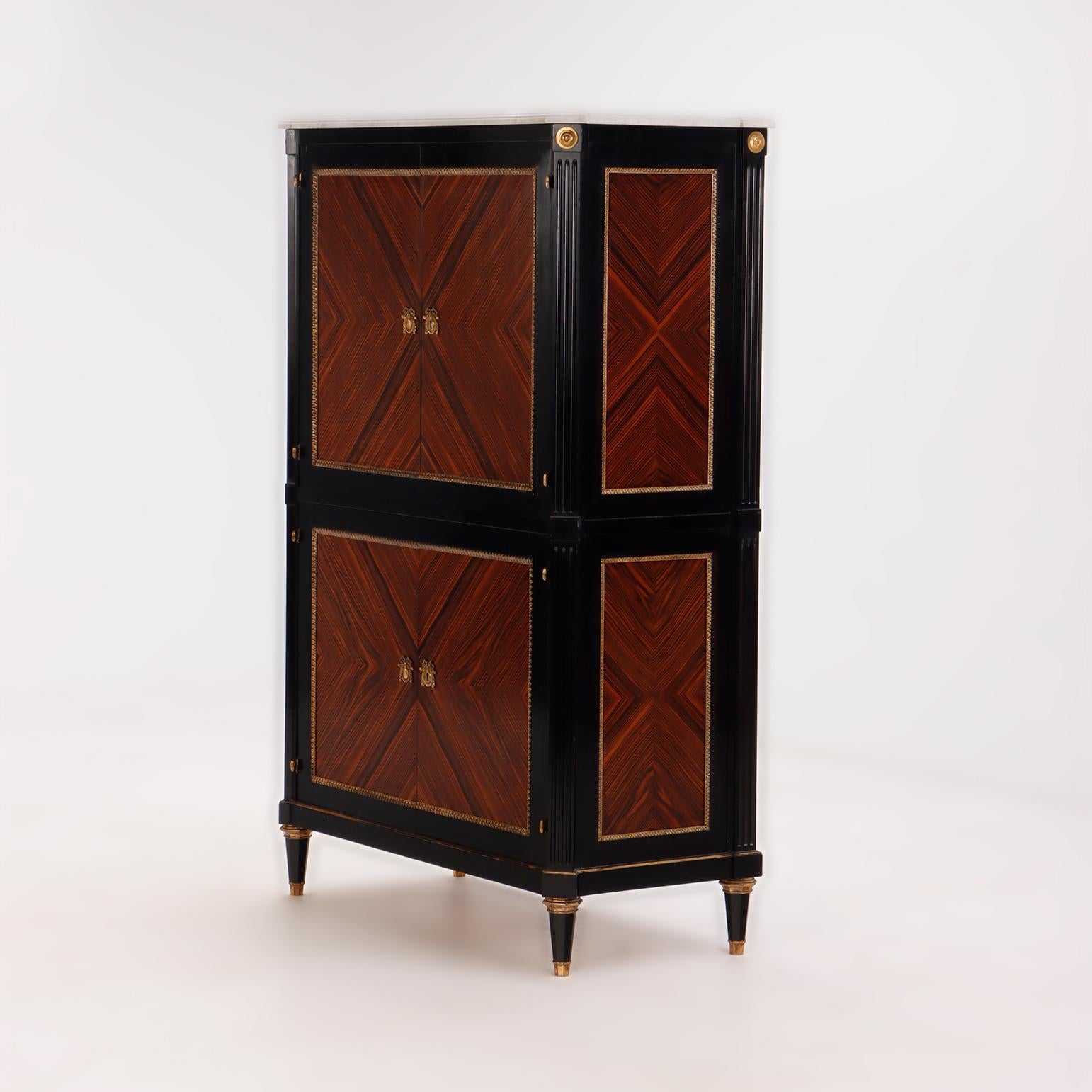 Marble A partial ebonized four door bar cabinet in the manner of Jansen circa 1940. For Sale