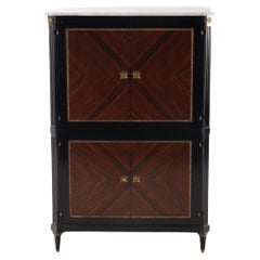A partial ebonized four door bar cabinet in the manner of Jansen circa 1940.