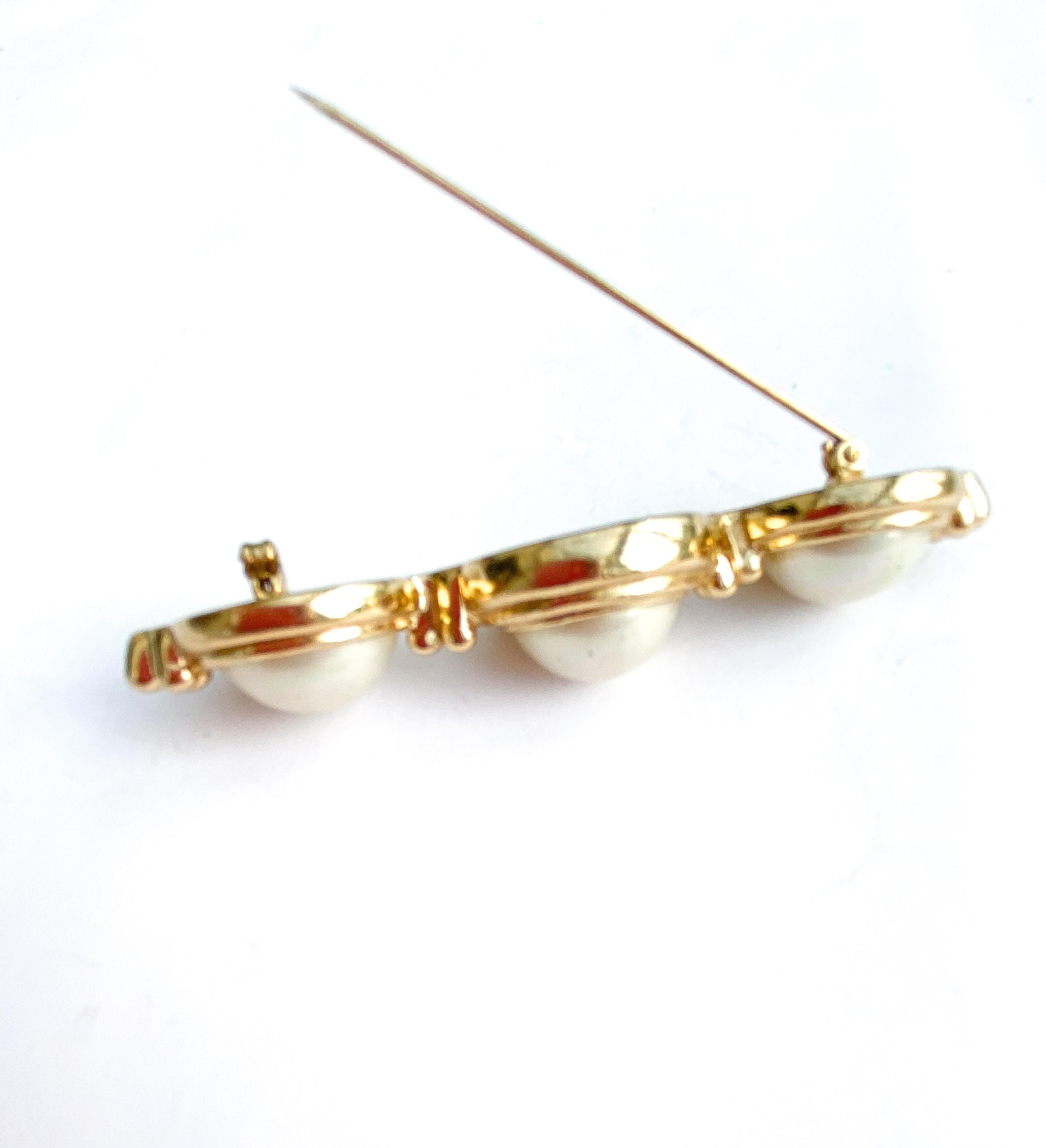 A paste pearl and gilt metal bar brooch and matching earrings, C. Dior, 1980s. 2