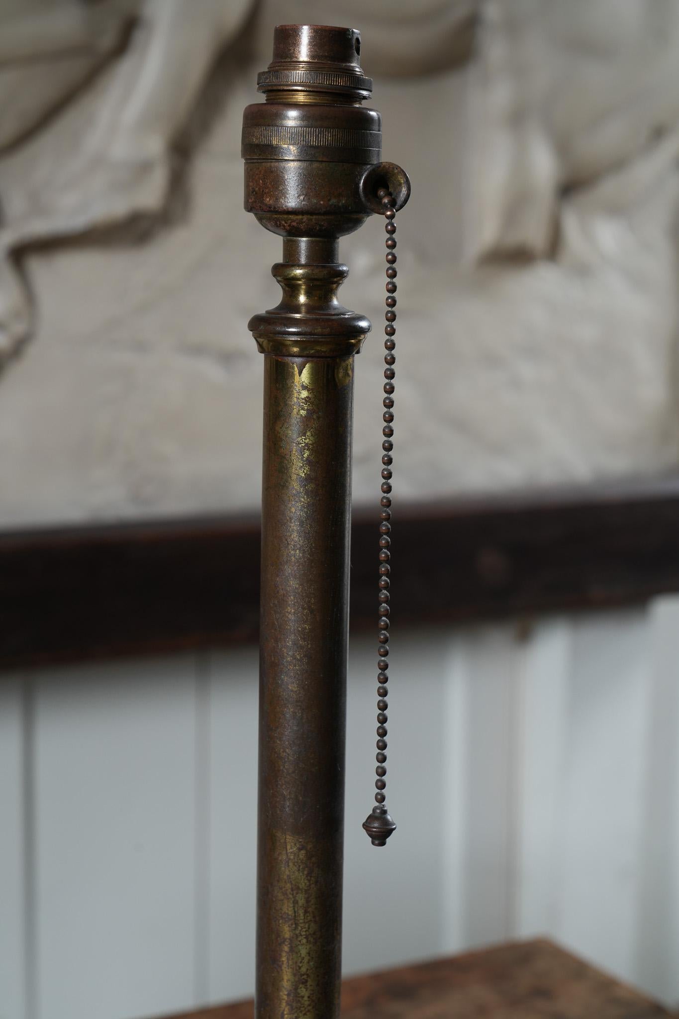 English A Patinated Brass Column Table Lamp For Sale