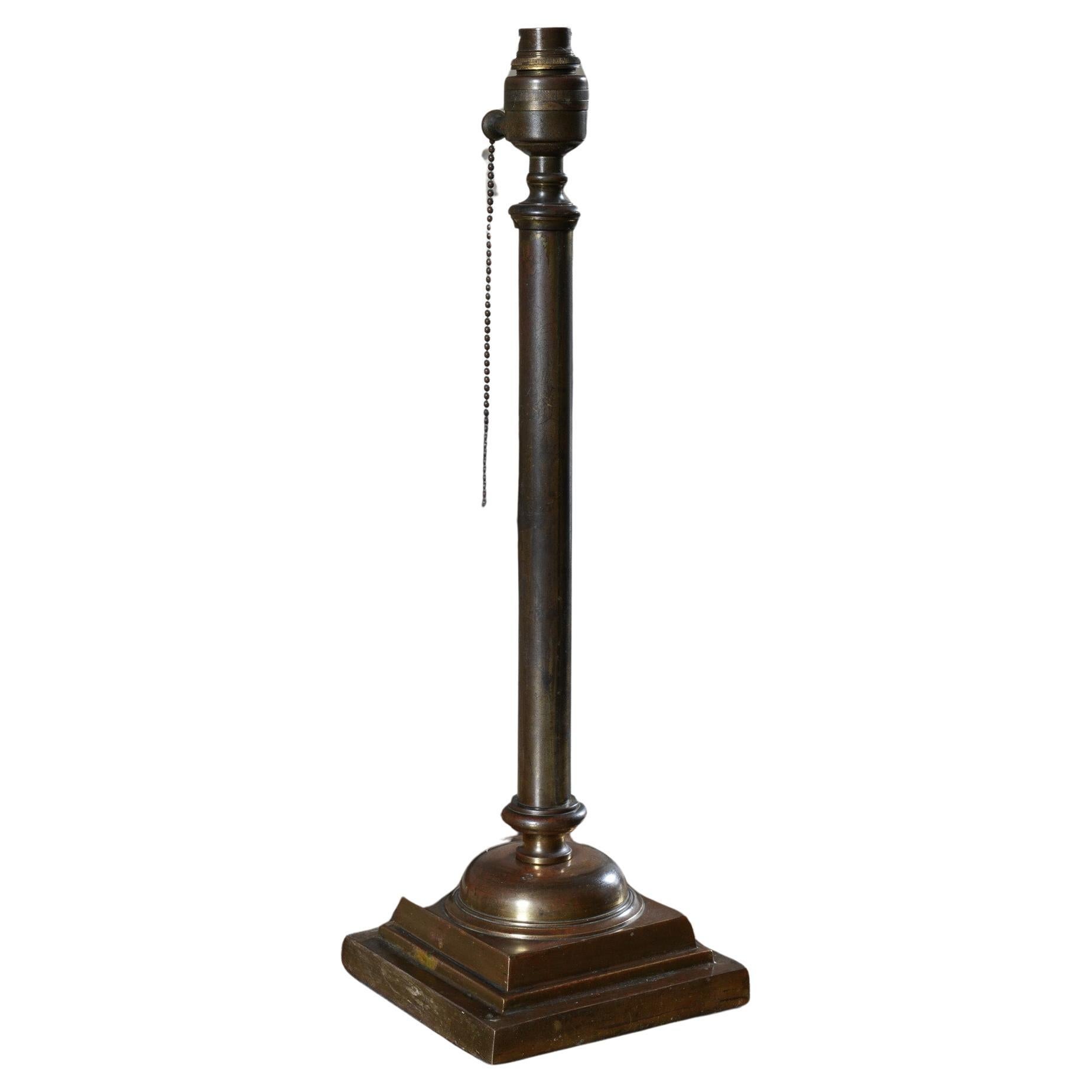 A Patinated Brass Column Table Lamp For Sale