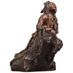 Figura de bronce patinado de un explorador nativo americano por Carl Kauba, hacia 1910