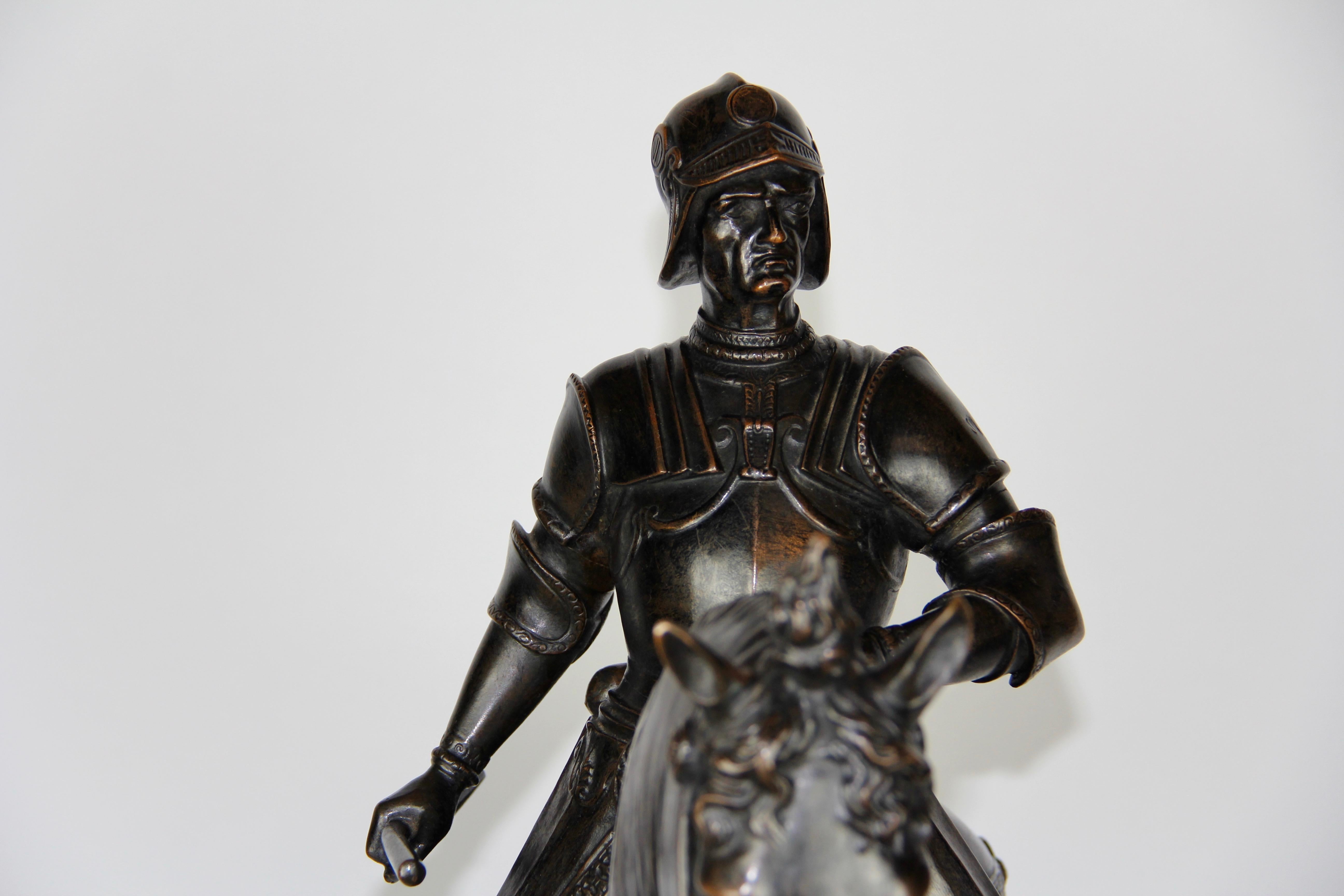 Patinated Bronze Figure of a Soldier on a Horse with a Helmet For Sale 3