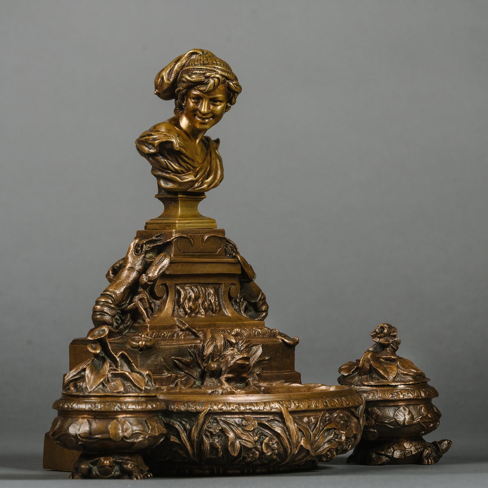 Inusual tintero escultórico de bronce patinado de Jean-Baptiste Carpeaux (1827-1875).

Modelada como una fuente con pedestal rematado por un busto de 