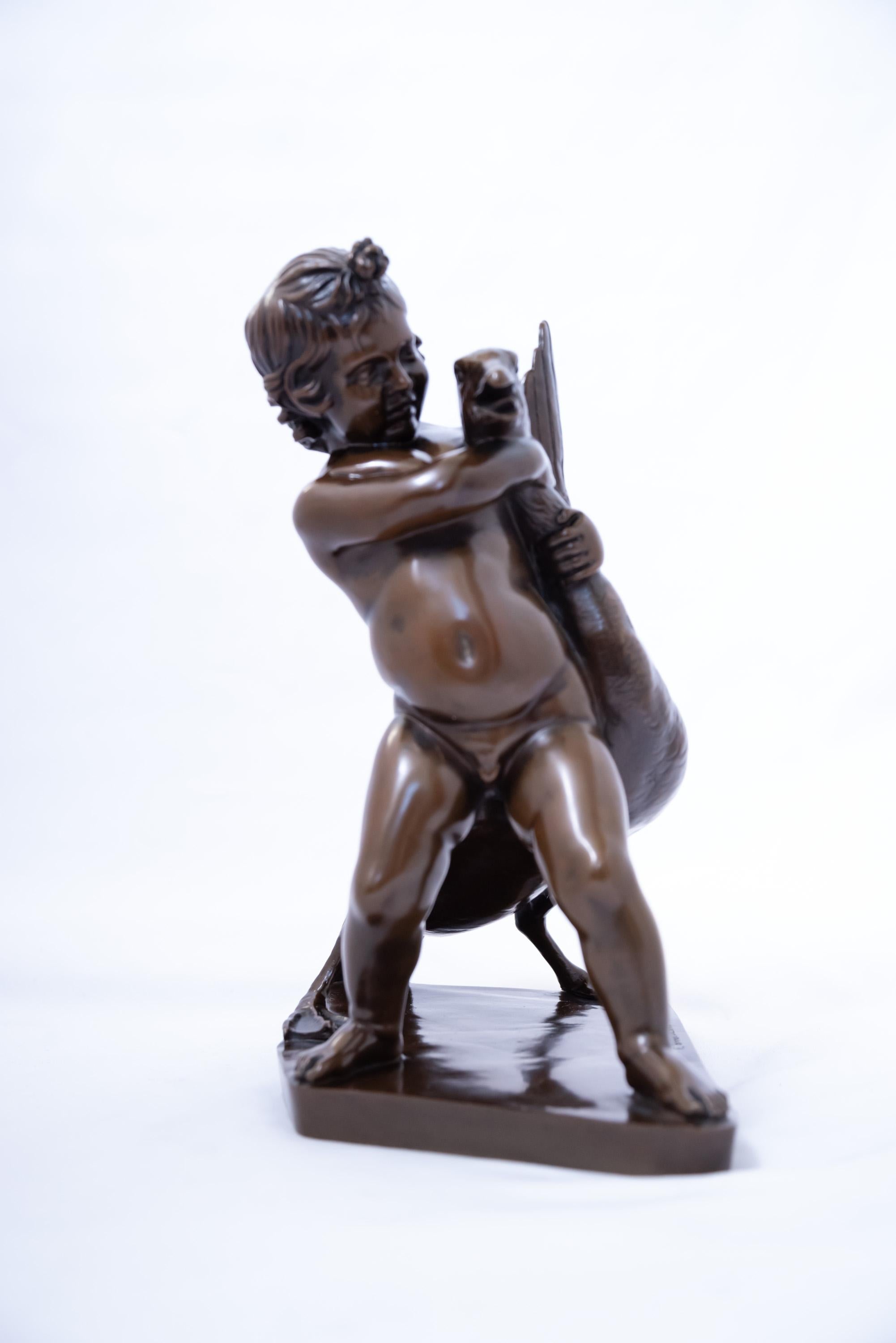 Français Sculpture en bronze patiné d'un garçon avec une oie en vente