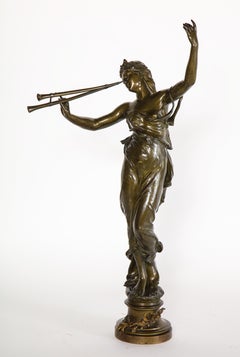 Escultura de bronce patinado de una mujer "Muses des Bois", firmada Eug. Marioton