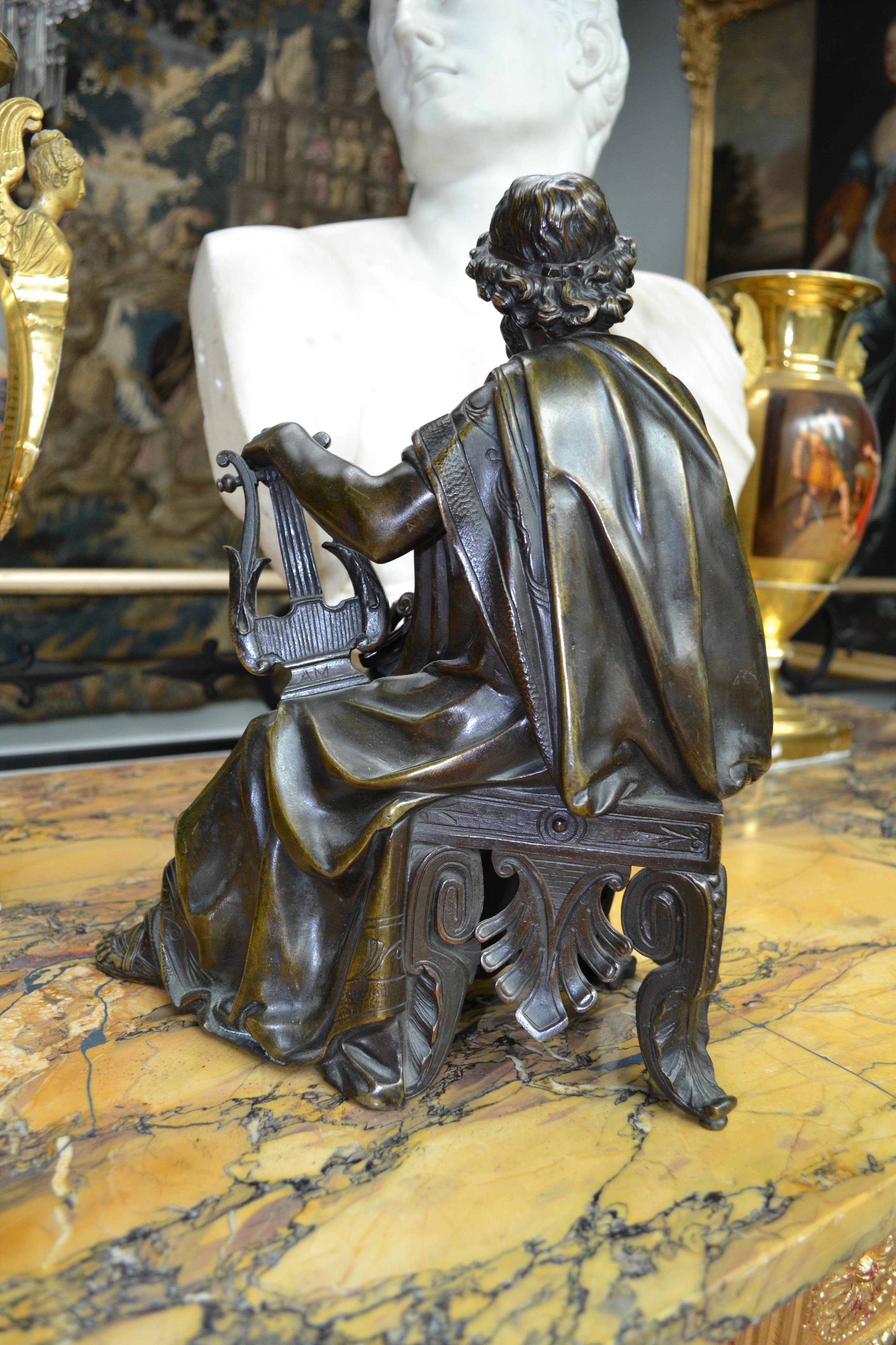Bronzo Una statua in bronzo patinato  di uno studioso classico seduto, firmato  Doriot in vendita