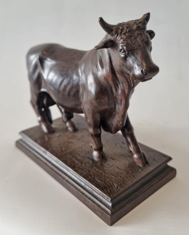 French A Patinated Iron Sculpture of a Bull For Sale