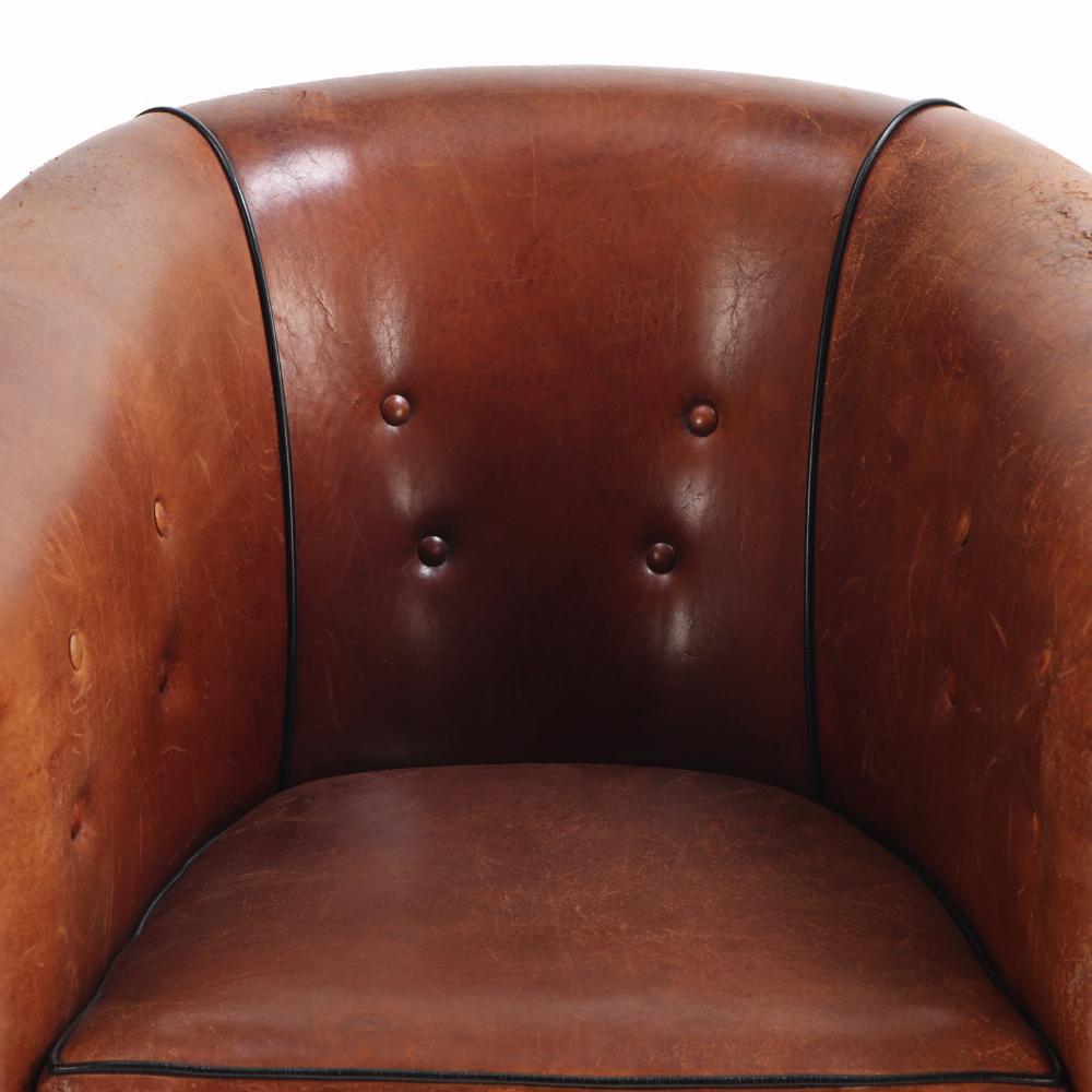 A Patinated Sheepskin Leather Club Chair, C. 1950 from Holland. In Good Condition For Sale In Philadelphia, PA