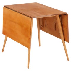 A Paul McCobb (American, 1917-1969), maple drop leaf dining table circa 1950.
