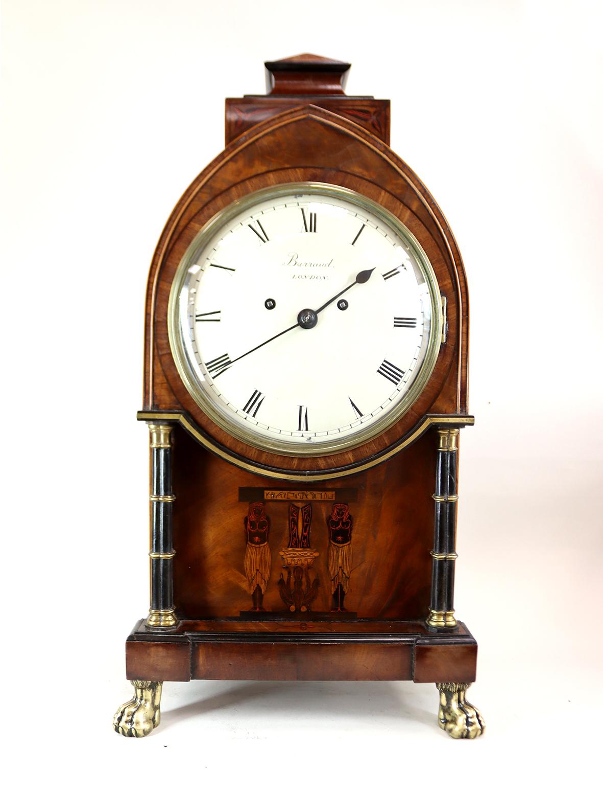 A very striking twin fusee bracket clock in an Egyptian revival style case by Paul Philip Barraud. The eight day movement with unusual round plates of thick brass engraved on the back and signed Barraud Cornhill LONDON. With an engraved pendulum of